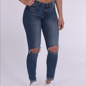 Ripped knee jeans